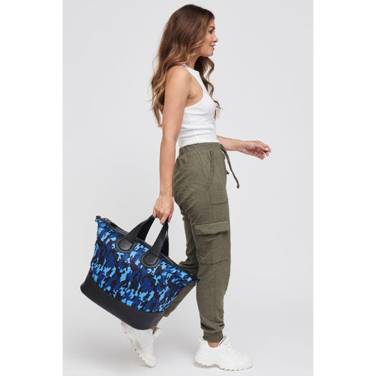 Dream Big Weekender Bag - Navy Camo
Find yourself hitting snooze every morning? While it’s tempting to stay in bed and keep dreaming, turn those dreams into reality with our Dream Big tote This stylish handbag features a handle and a cross body strap. It’s interior pocket will accommodate your tablet and all of your necessities to crush those goals. Because your dreams should always be bigger than your bag. Item Type: Weekender Material: Neoprene Closure: Zipper Handle Drop: 6'' Shoulder Strap: 16''-25'' In