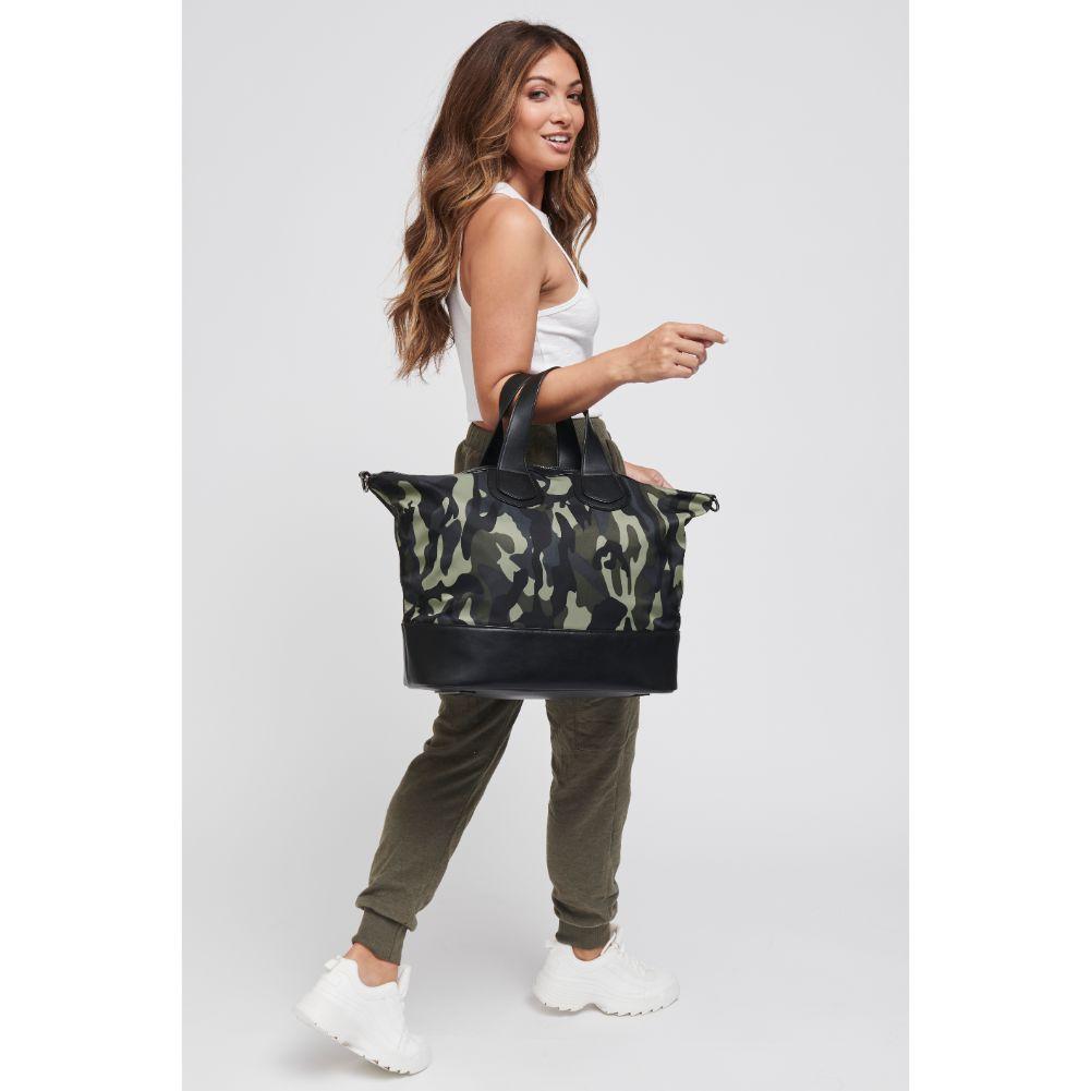 Dream Big Weekender Bag - Camo
Find yourself hitting snooze every morning? While it’s tempting to stay in bed and keep dreaming, turn those dreams into reality with our Dream Big tote This stylish handbag features a handle and a cross body strap. It’s interior pocket will accommodate your tablet and all of your necessities to crush those goals. Because your dreams should always be bigger than your bag. Item Type: Weekender Material: Neoprene Closure: Zipper Handle Drop: 6'' Shoulder Strap: 16''-25'' Inside