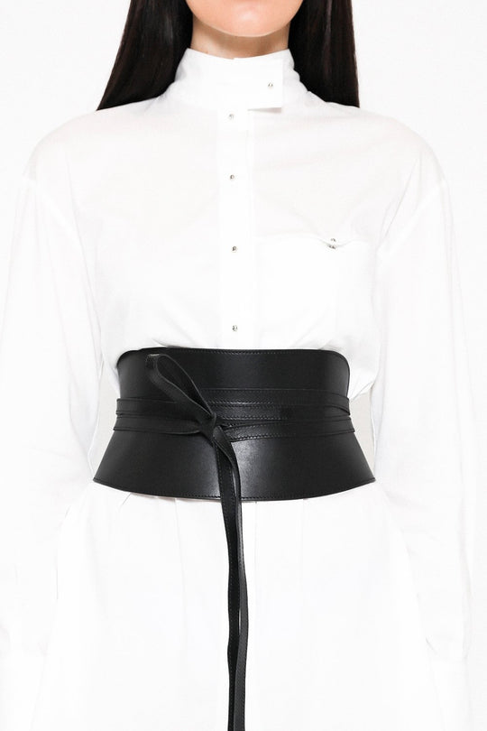 Corset Belt - Silver
PRITCH London's first ever created obi corset belt in classic black. This Japanese inspired wrap around tie belt with seam detailing has the label's signature aesthetic. Designed to shape and define your waist, this sculpting leather piece is made of two leather panels that form a feminine yet strong silhouette. The belt is finished off with two long straps that can be tied around in many different ways, so every time you get a newer version of the knot. Instantly update any outfit with