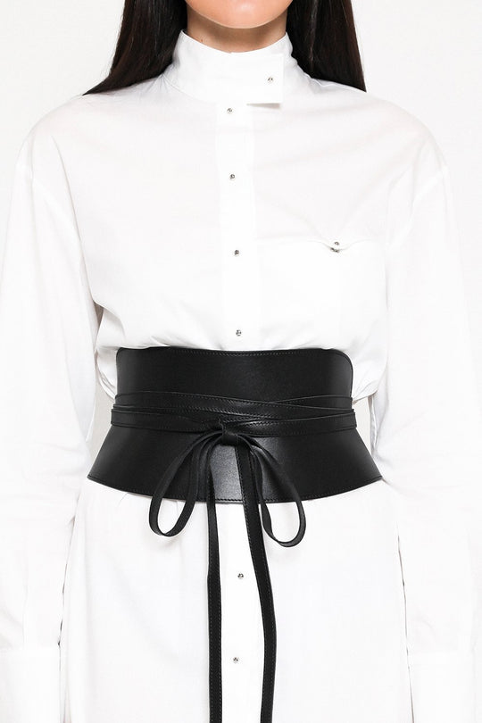 Corset Belt - Red - Special Order
PRITCH London's first ever created obi corset belt in classic black. This Japanese inspired wrap around tie belt with seam detailing has the label's signature aesthetic. Designed to shape and define your waist, this sculpting leather piece is made of two leather panels that form a feminine yet strong silhouette. The belt is finished off with two long straps that can be tied around in many different ways, so every time you get a newer version of the knot. Instantly update an