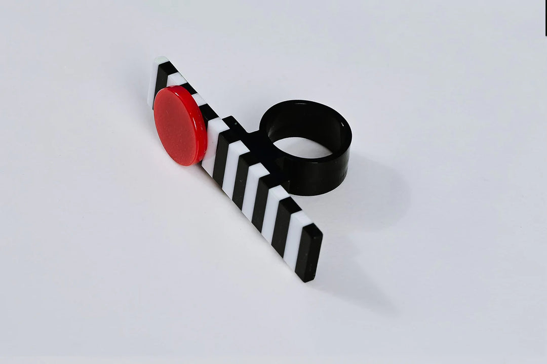 Zebra Acrylic Ring
Bold and beautiful, the Michaela Malin black & white stripe ring with red dot.is comfortable and striking. Light weight Acrylic About 2.75" length Handmade in Israel Encapsulating the spirit of innovation, Michaela Malin derives inspiration for her designs and aesthetics from architectural forms and way of thought.
Zebra Acrylic Ring
Bold and beautiful, the Michaela Malin Totem Earrings are whimsical and striking. Perfect for any occasion. Material: Acrylic
zebra7

$125
$125
$125
abstract